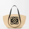 Mittlerer „Eclipse“-Korb aus Raffia und Kalbsleder Mittlerer „Eclipse“-Korb aus Raffia und Kalbsleder