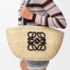 Mittlerer „Eclipse“-Korb aus Raffia und Kalbsleder Mittlerer „Eclipse“-Korb aus Raffia und Kalbsleder