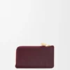 Pebble-Geldbörse aus glänzendem Nappa-Kalbsleder Pebble-Geldbörse aus glänzendem Nappa-Kalbsleder