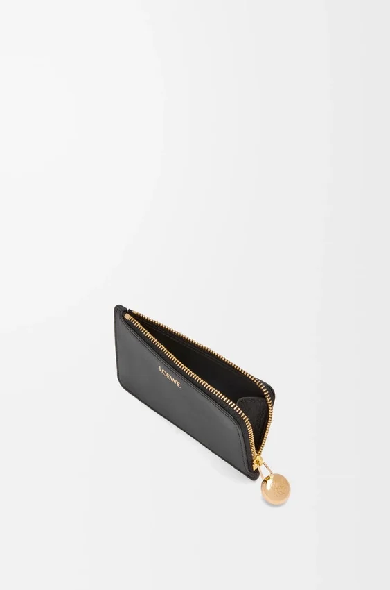 Pebble-Geldbörse aus glänzendem Nappa-Kalbsleder Pebble-Geldbörse aus glänzendem Nappa-Kalbsleder