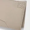 Puzzle-Portemonnaie zum Aufklappen aus klassischem Kalbsleder Puzzle-Portemonnaie zum Aufklappen aus klassischem Kalbsleder