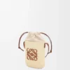 Quadratische Tasche aus Iraca-Palmengeflecht und Kalbsleder Quadratische Tasche aus Iraca-Palmengeflecht und Kalbsleder