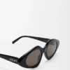 Schmale Sonnenbrille in Dreiecksform Schmale Sonnenbrille in Dreiecksform
