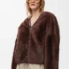 Strickjacke aus Lammfell Strickjacke aus Lammfell