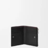 Switch Slim Compact Portemonnaie aus geschmeidigem genarbtem Kalbsleder und Wildleder Switch Slim Compact Portemonnaie aus geschmeidigem genarbtem Kalbsleder und Wildleder