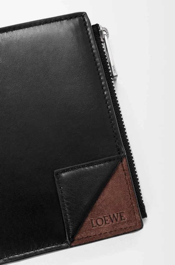 Switch Slim Compact Portemonnaie aus geschmeidigem genarbtem Kalbsleder und Wildleder Switch Slim Compact Portemonnaie aus geschmeidigem genarbtem Kalbsleder und Wildleder