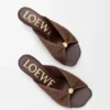 Weiche Pantolette mit „Pebble“-Design aus Stoff in Raffia-Optik Weiche Pantolette mit „Pebble“-Design aus Stoff in Raffia-Optik